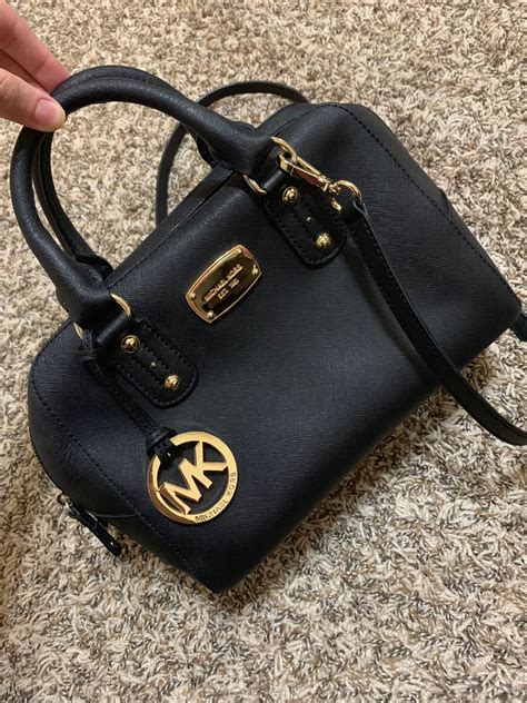 michael kors black gold accents|Michael Kors gold style women.